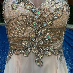 Beautiful Gown size 2 worn once, soft peach color paid $525 Comfortable to wear